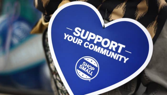 A blue heart that says "Support Your Community, Shop Small" from the Philadelphia Department of Commerce.